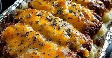 Cheesy Meatloaf Over Creamy Mashed Potatoes